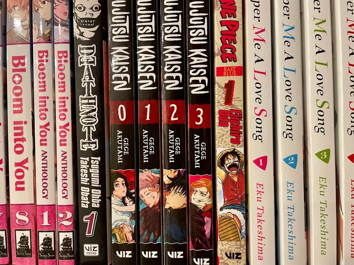 Bookshelf featuring different manga volumes